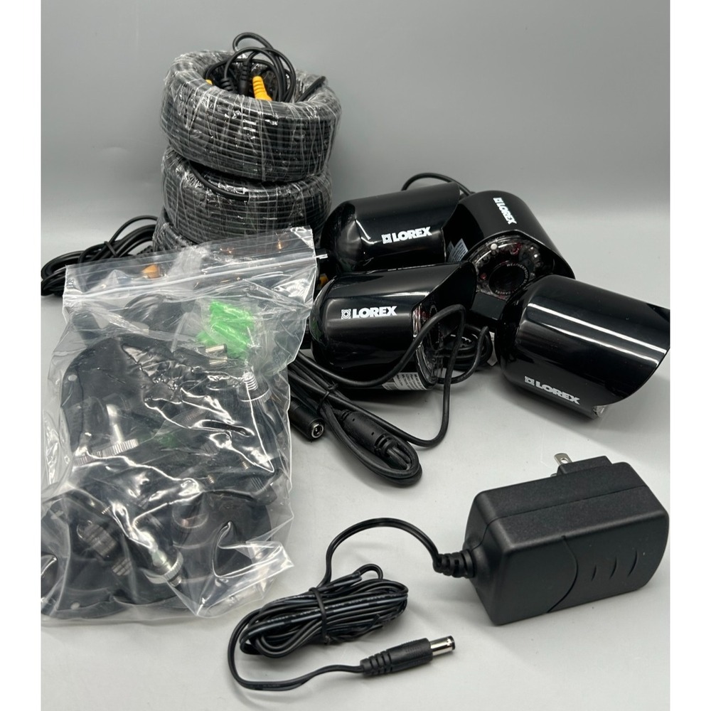 4 Lorex MC6950 Security Cameras with 3 Sets of Cables, Power Adapter & Splitter